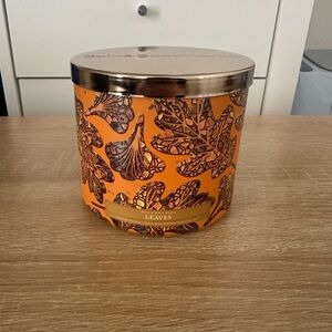 Bath & Body Works Leaves Scented Candle with Orange and Brown Design